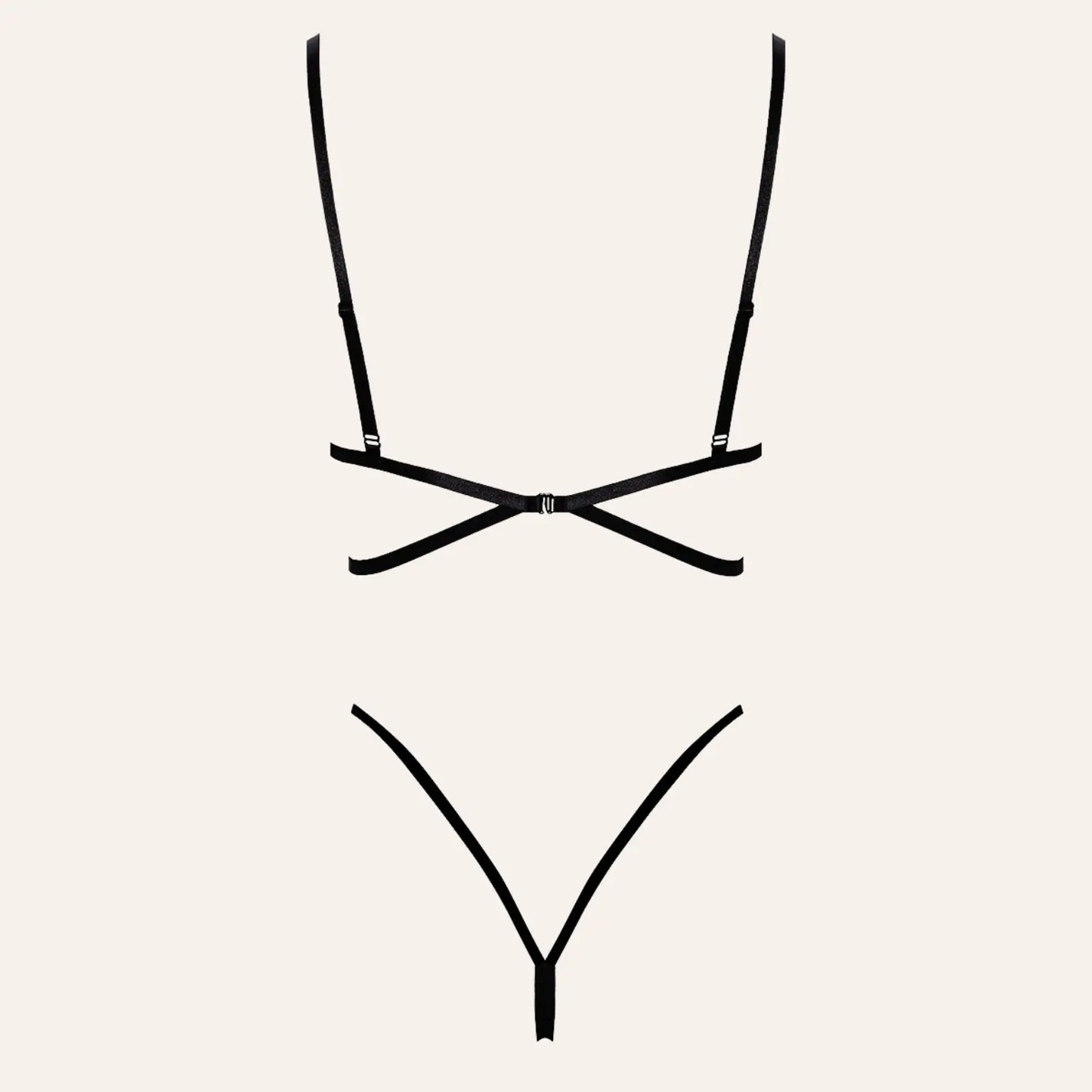 Vue arrière de l'ensemble 2 pièces en dentelle noire, montrant les bretelles croisées et les détails minimalistes.