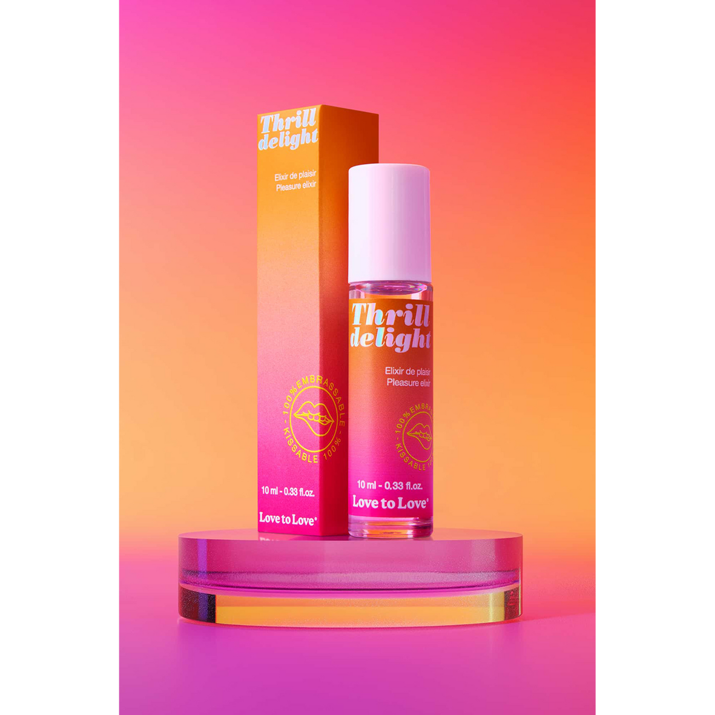 Application du gel orgasmique Thrill Delight roll-on coco sur fond rose pailleté festif - Oh My God'Z