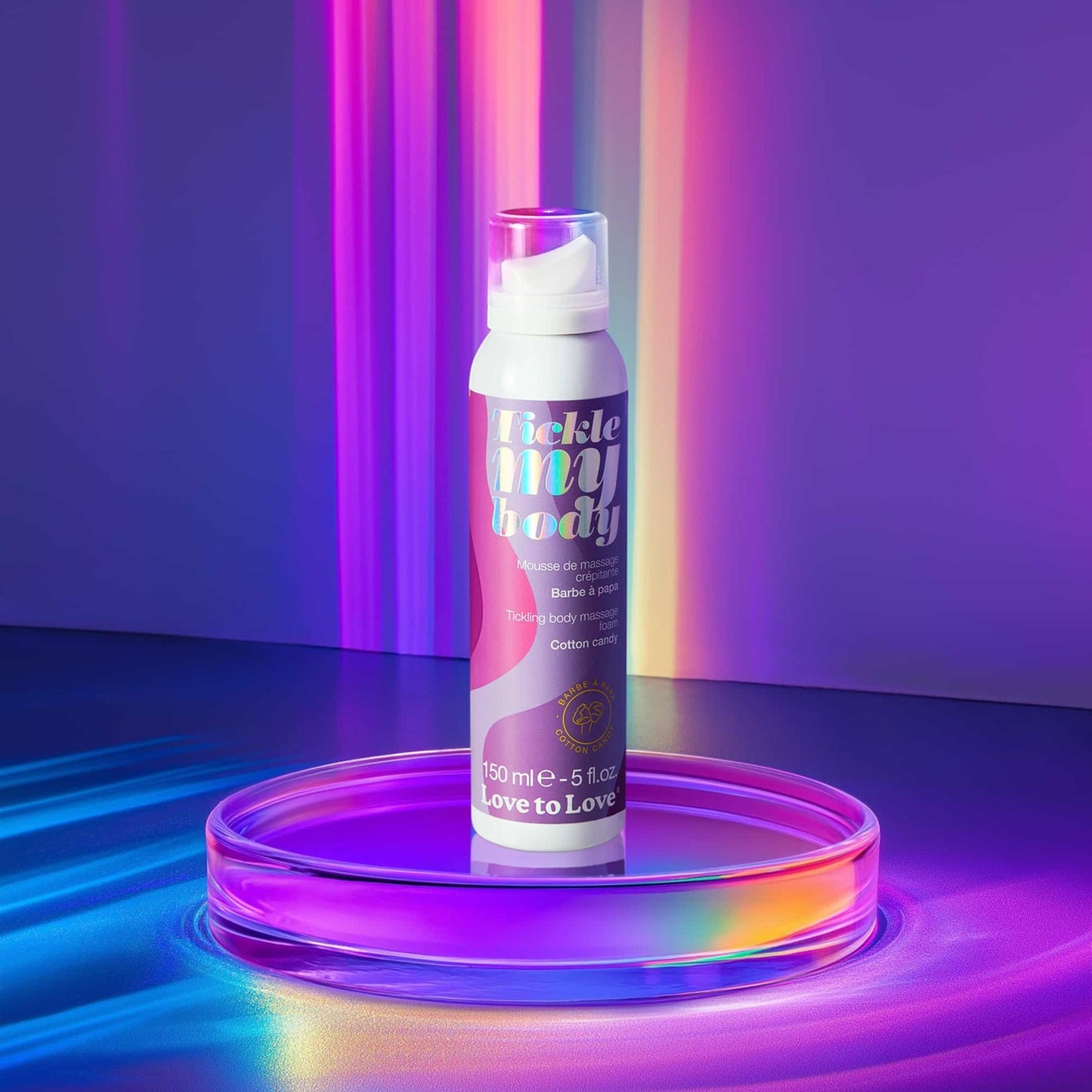 Flacon de mousse corporelle Tickle My Body barbe à papa sur plateau holographique, packaging violet et rose - Oh My God'Z