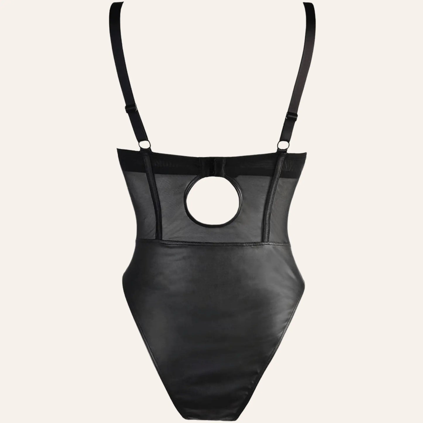 Vue arrière du body V-10590 par Axami, disponible chez Oh My God'Z. Ce body noir présente un design audacieux avec une découpe au dos, ajoutant une touche de séduction supplémentaire.