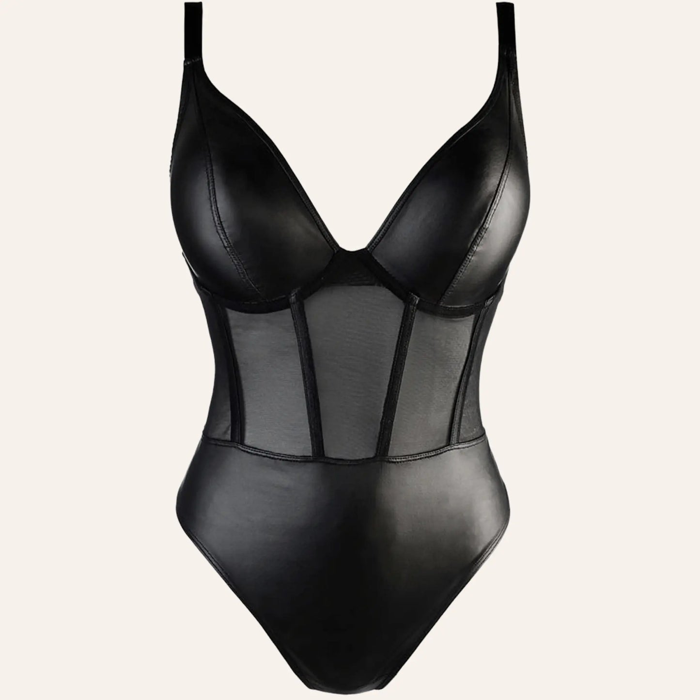 Gros plan sur le body V-10590 d'Axami, disponible chez Oh My God'Z. Ce body noir allie des matériaux luxueux avec des détails en tulle transparent pour un effet visuel captivant.
