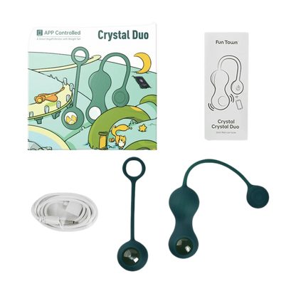 Packaging des boules de Kegel vibrantes connectées Crystal Duo, disponible chez Oh My God'Z, incluant un set complet pour des exercices pelviens connectés, contrôlés via une application mobile pour des résultats optimaux.