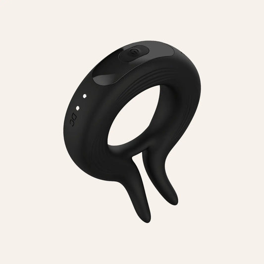 Image du Cockring vibrant Marry Me de Wooomy en silicone noir mat, design ergonomique et waterproof, disponible sur Oh My God'Z. Un bijou de technologie érotique pour optimiser les performances sexuelles et le plaisir des deux partenaires.