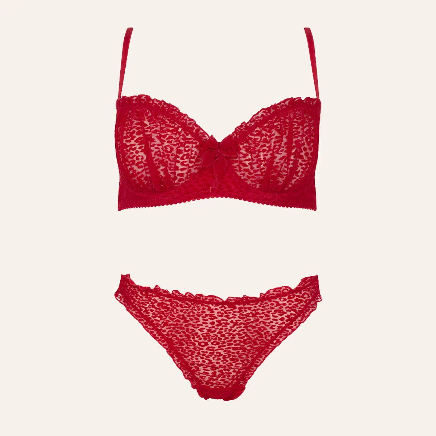 Ensemble Catilla de Passion, lingerie rouge à motifs léopard vue de face, exposé en plan produit sur fond neutre, proposé par Oh My God'Z – une pièce glamour à associer à des sextoys haut de gamme pour des jeux intimes raffinés.