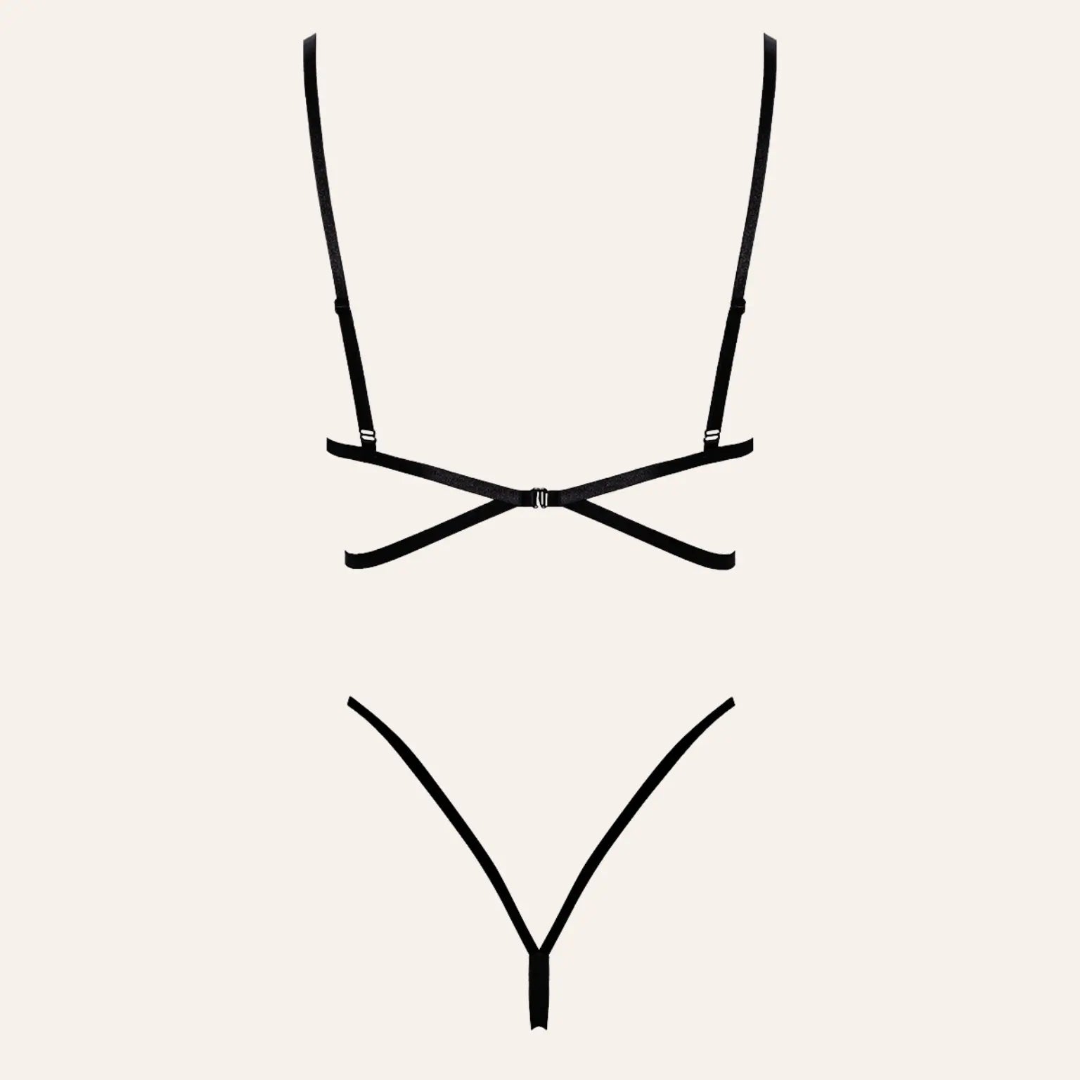 Vue arrière de l'ensemble 2 pièces en dentelle noire, montrant les bretelles croisées et les détails minimalistes.