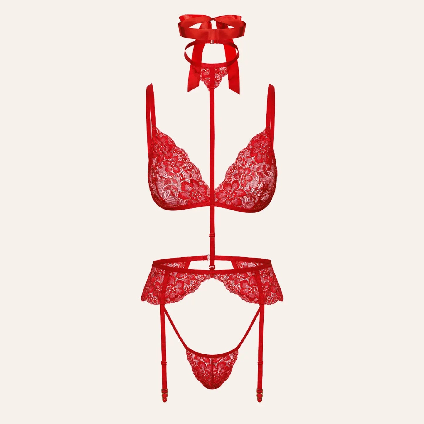 Vue complète d’un ensemble de lingerie rouge en dentelle comprenant un soutien-gorge, une culotte, des jarretelles et un ruban décoratif autour du cou.