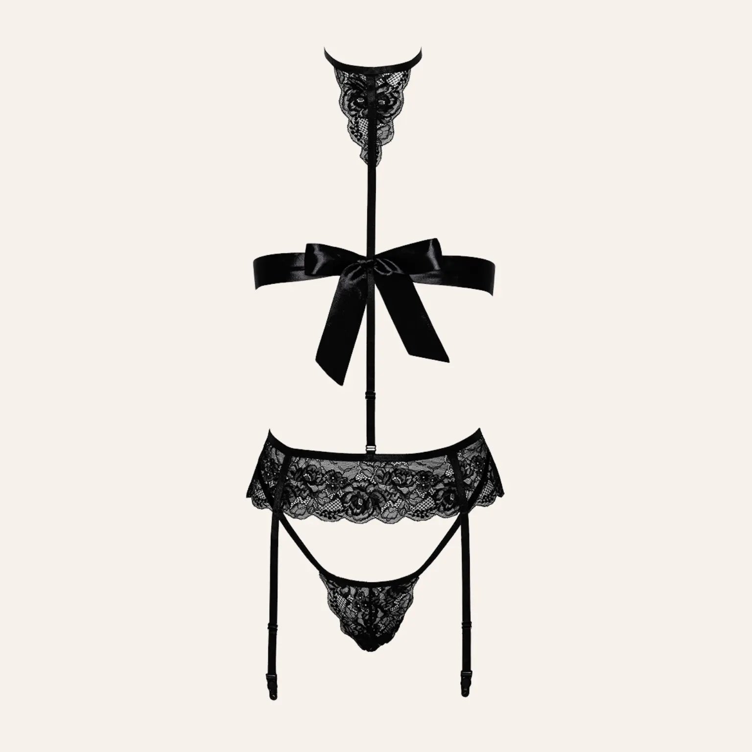 Mannequin portant l'ensemble Bondage Black Set 4 pièces Kiss 244 avec un ruban noir en satin noué, vue de face.