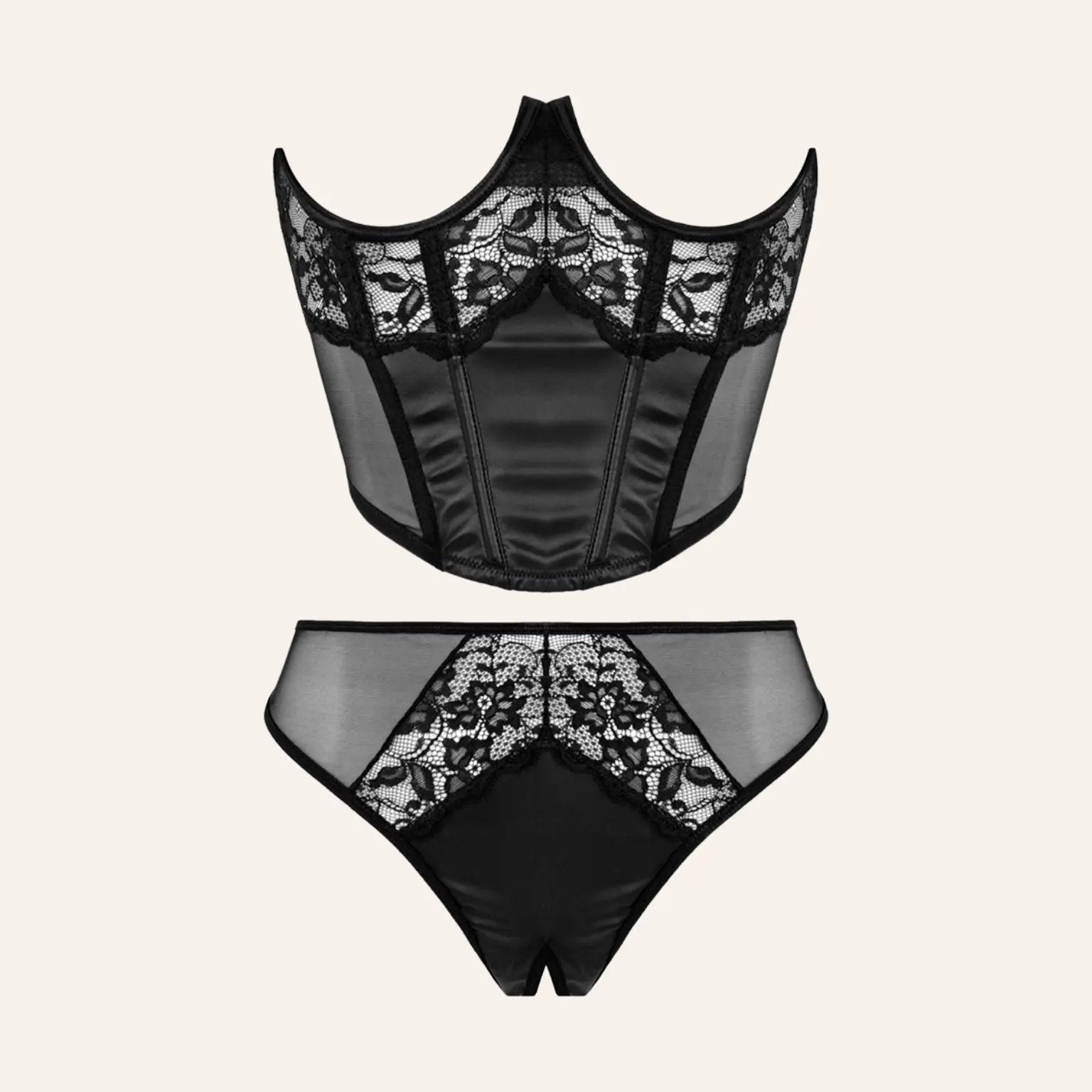 Ensemble de lingerie noire comprenant un bustier en dentelle et un string assorti, présenté sur un fond neutre.