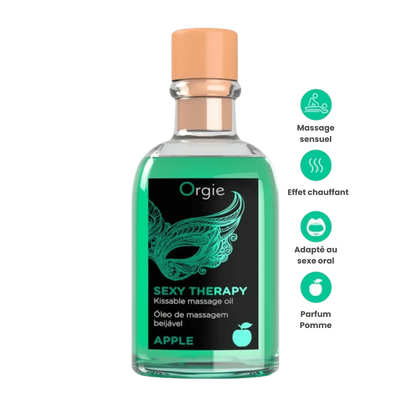 Flacon transparent d'huile de massage embrassable Sexy Therapy Pomme de la marque Orgie avec des icônes indiquant le massage sensuel, l'effet chauffant, et adapté au sexe oral, avec parfum pomme.