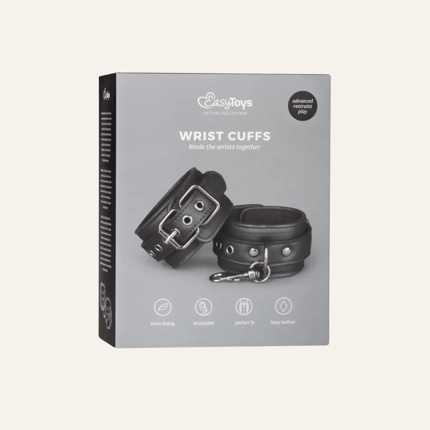 Boîte du produit Easytoys Fetish Collection Wrist Cuffs, mettant en avant les menottes ajustables pour poignets. Disponibles chez Oh My God'Z, ces accessoires fétichistes de luxe allient design élégant, confort et fonctionnalité pour enrichir vos jeux BDSM.