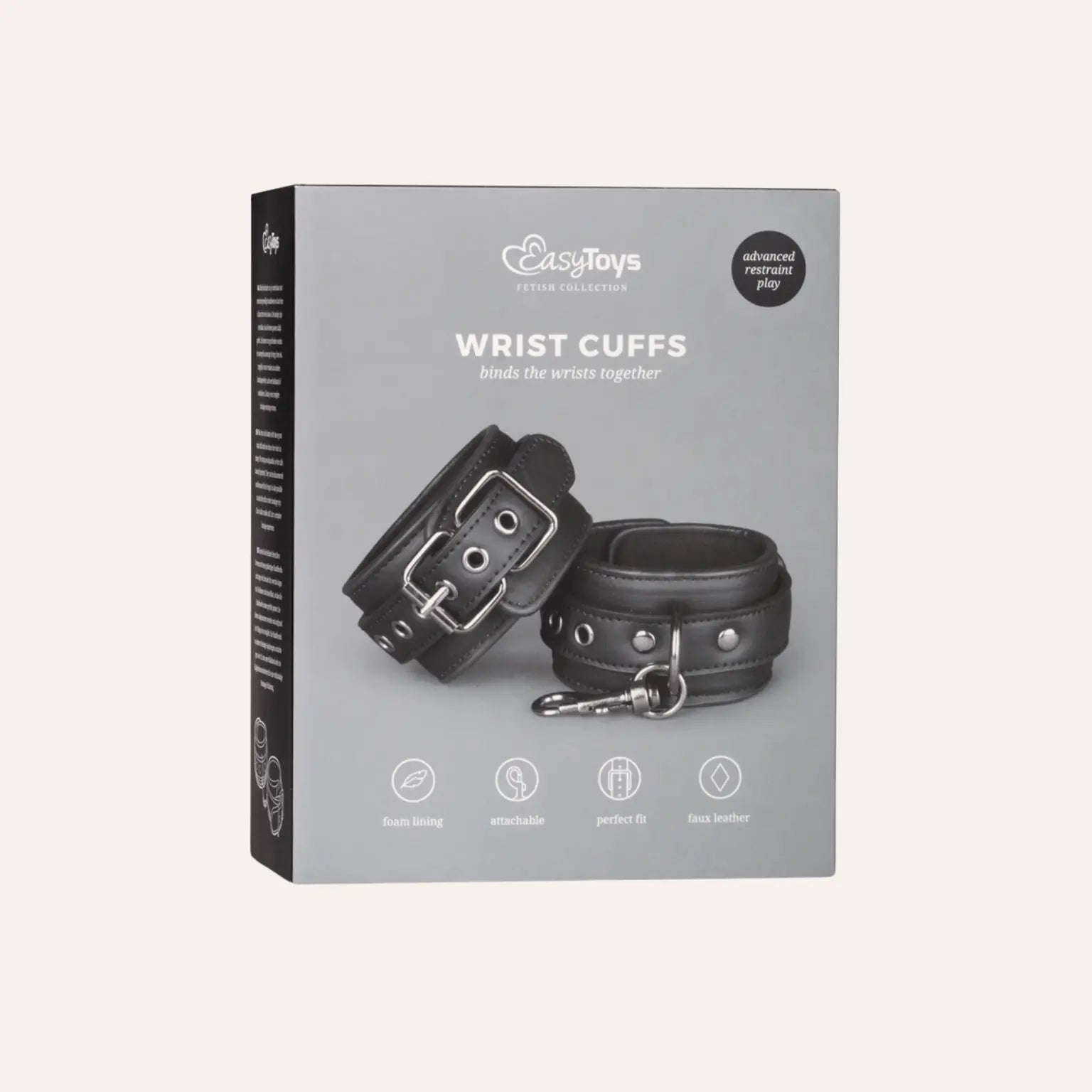 Boîte du produit Easytoys Fetish Collection Wrist Cuffs, mettant en avant les menottes ajustables pour poignets. Disponibles chez Oh My God'Z, ces accessoires fétichistes de luxe allient design élégant, confort et fonctionnalité pour enrichir vos jeux BDSM.