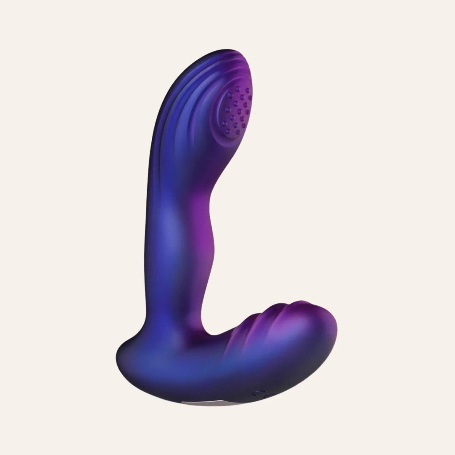 Plug anal Galaxy Hueman en position inclinée, montrant ses deux extrémités incurvées pour une double stimulation. Idéal pour les adeptes de sextoys de luxe, ce modèle disponible chez Oh My God'Z promet des sensations inédites grâce à sa technologie de tapotement.