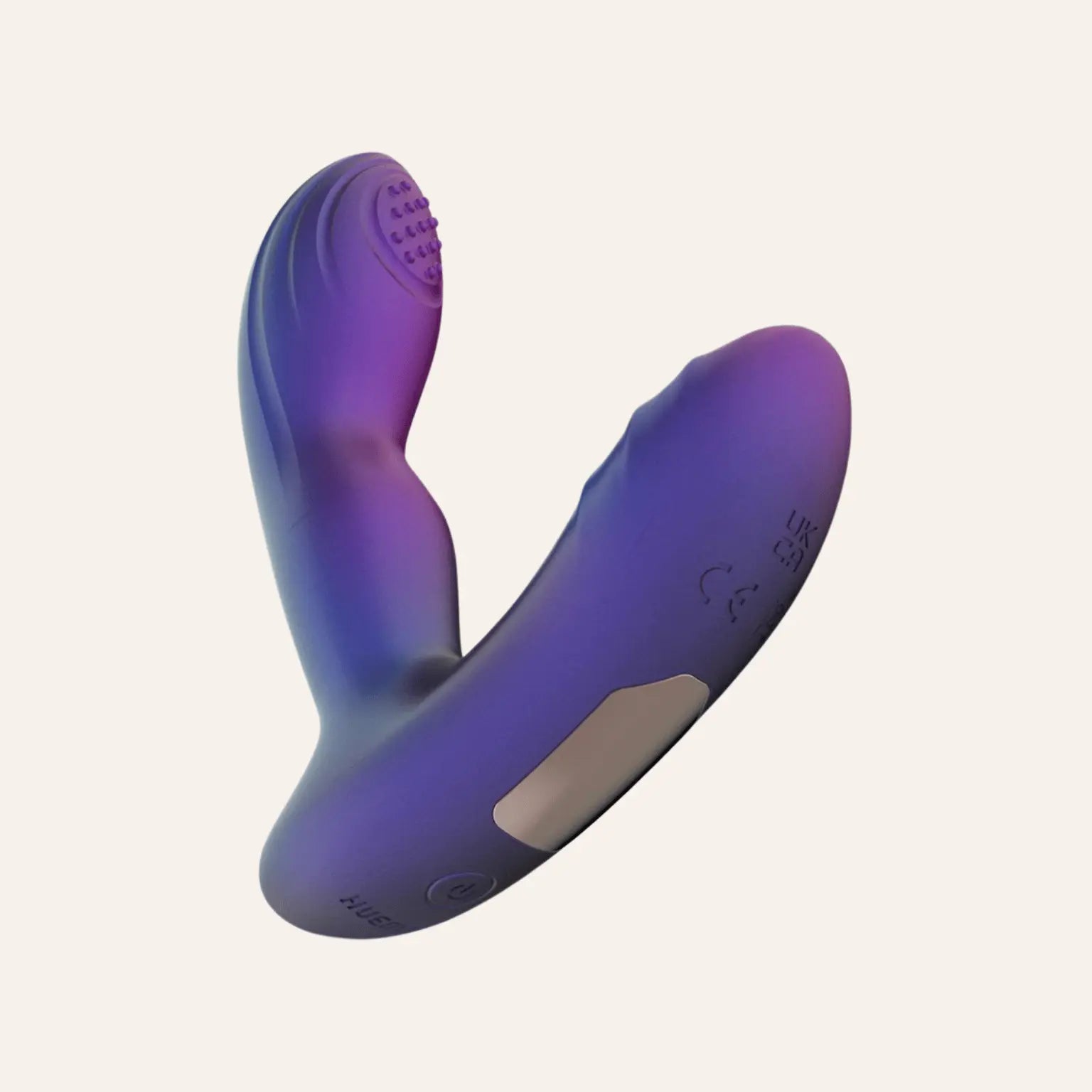 Le plug anal Galaxy de Hueman vu de profil, mettant en valeur ses zones texturées pour une stimulation optimale du point P. Disponible chez Oh My God'Z, ce sextoy premium allie esthétique futuriste et performance grâce à sa technologie de tapotement unique.