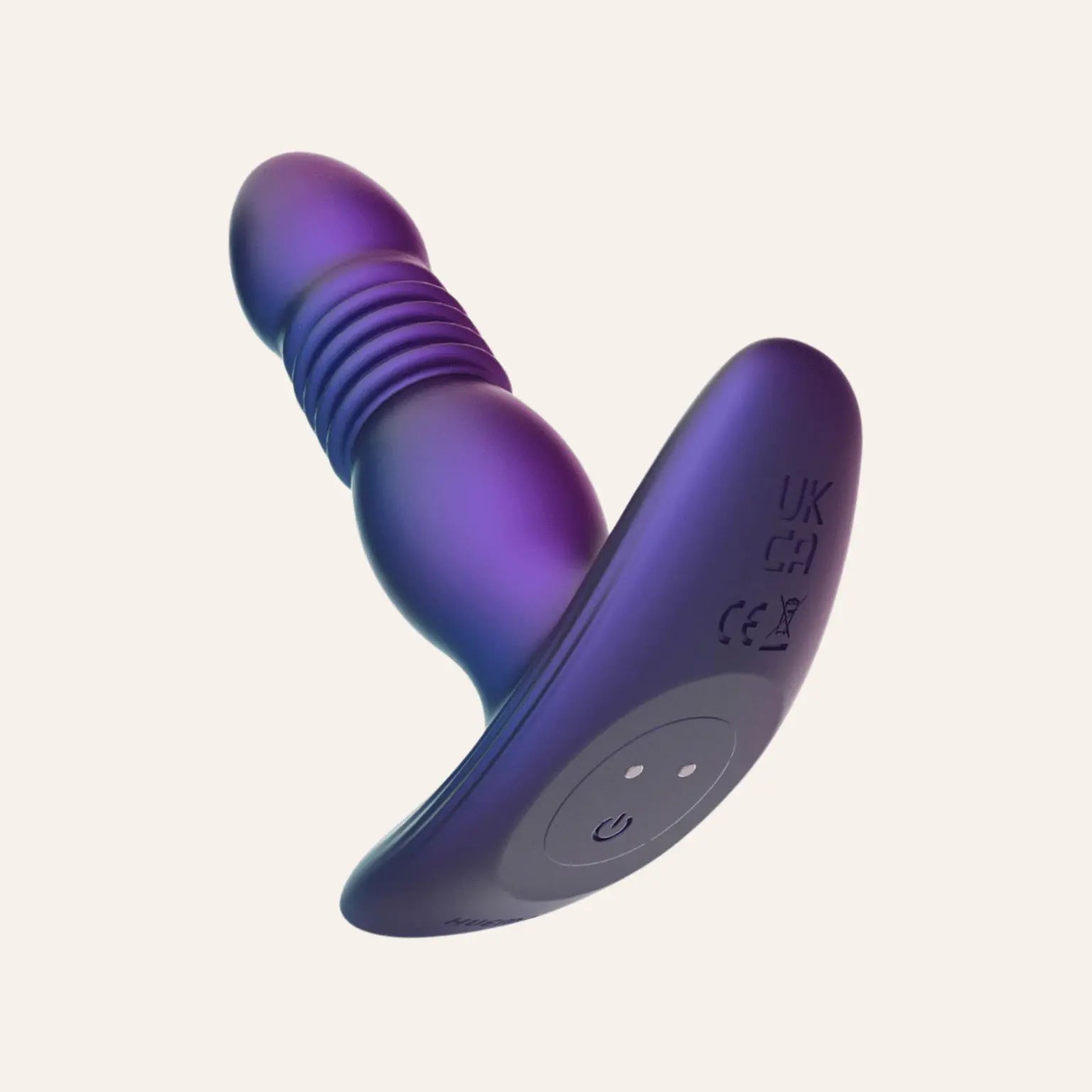 Vue inclinée du plug anal vibrant Supernova de Hueman, mettant en avant le bouton de contrôle situé à la base et les certifications CE et UKCA. Un sextoy connecté de qualité premium, disponible chez Oh My God'Z.