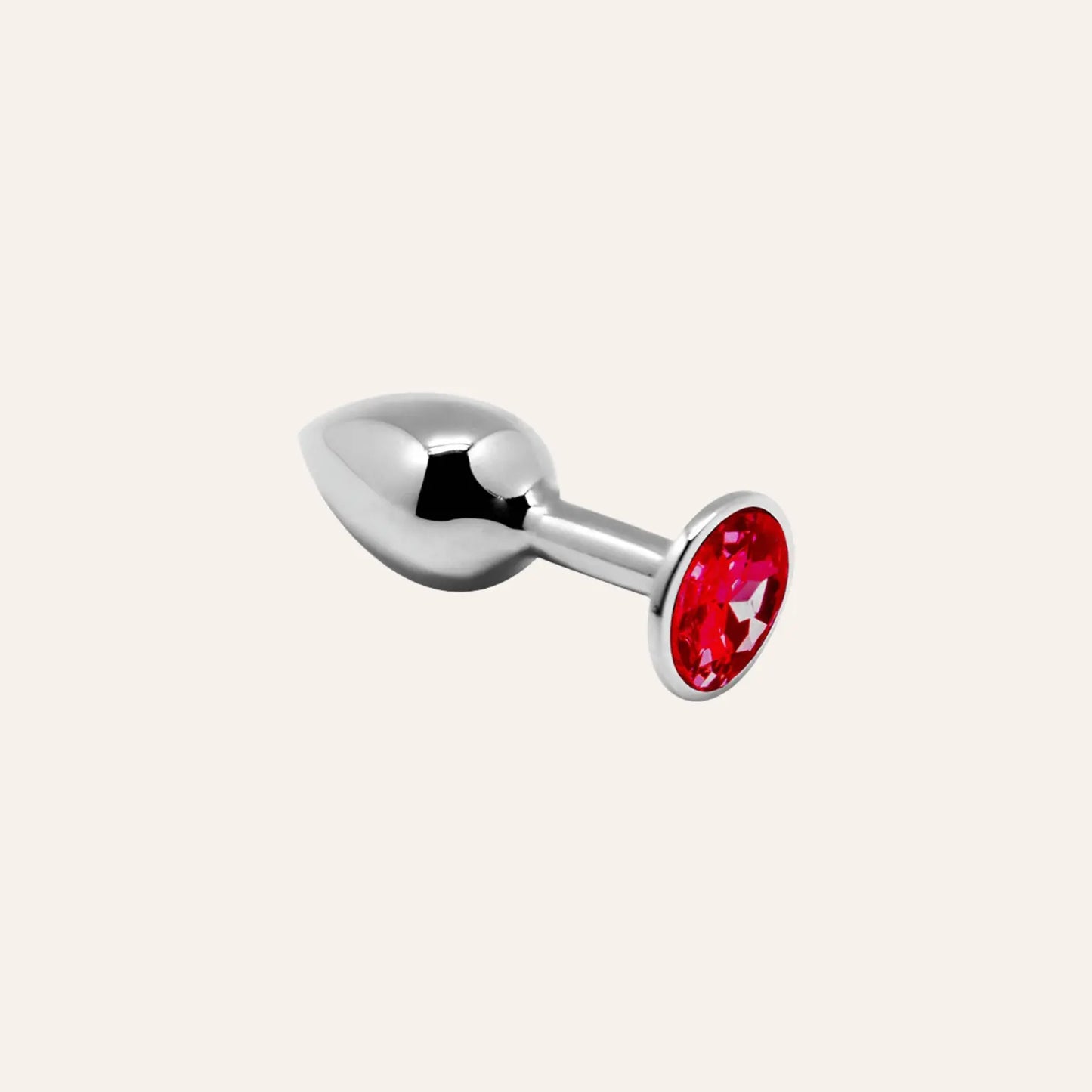 Plug anal métallique de luxe avec bijou rouge scintillant, conçu pour le confort et le plaisir. Un accessoire incontournable pour les amateurs de sextoys haut de gamme, proposé par Oh My God'Z.