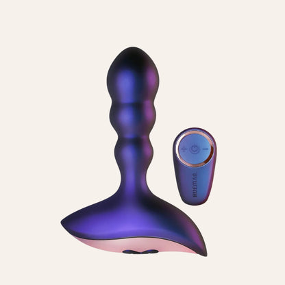 Sextoy Interstellar de Hueman avec télécommande sans fil, plug anal vibrant haut de gamme en finition galactique, proposé par la boutique Oh My God'Z pour une exploration anale contrôlée et luxueuse.