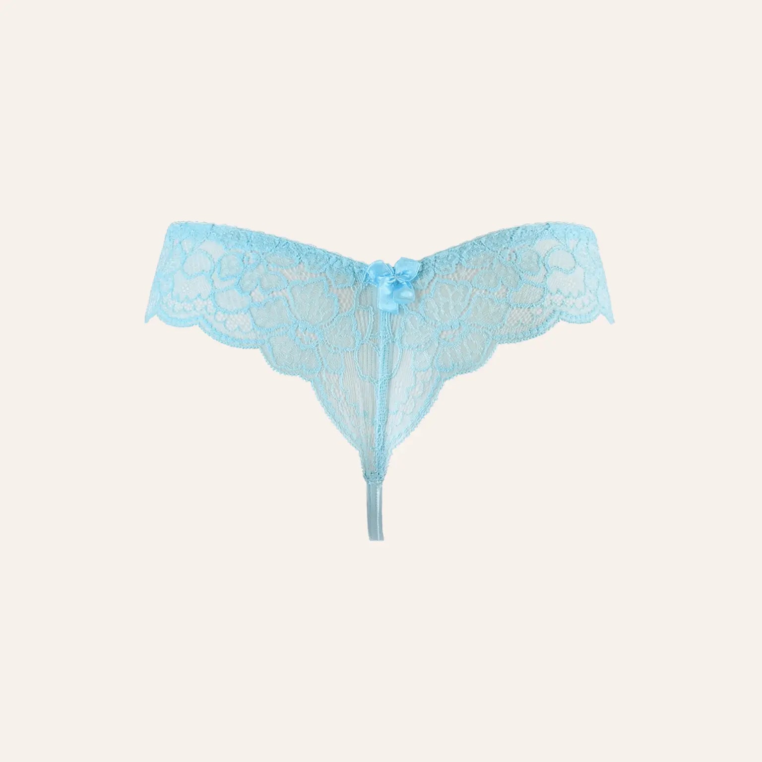 String tanga bleu transparent en dentelle florale V-10128 signé Axami, une pièce élégante et sensuelle disponible chez Oh My God'Z. Parfait pour sublimer votre collection de lingerie haut de gamme.
