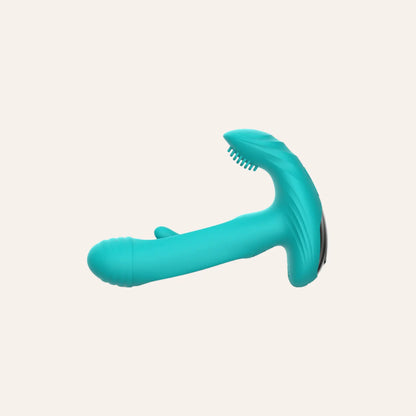 Vue latérale du vibromasseur Gina Good Vibes Only turquoise, mettant en avant son embout texturé et ses courbes conçues pour la stimulation du point G et du clitoris. Un jouet intime haut de gamme proposé par Oh My God'Z.