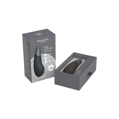 Stimulateur clitoridien Womanizer Enhance en noir et gris avec sa boîte élégante, un must-have dans l’univers des sextoys premium chez Oh My God'Z.