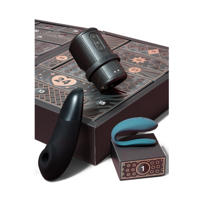 Coffret calendrier Avent Luxury avec masturbateur Arcwave Zing, Womanizer Enhance et We-Vibe Sync Lite - Oh My God'Z