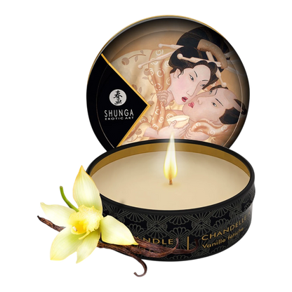 Bougie de massage vanille Shunga dans boîte noire et or, cire beige avec mèche allumée et orchidée - Oh My God'Z