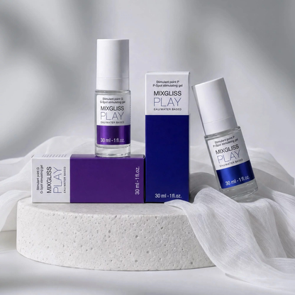 Duo de gels Mixgliss Play point G violet et point P bleu, flacons verre et etuis sur socle blanc - Oh My God'Z