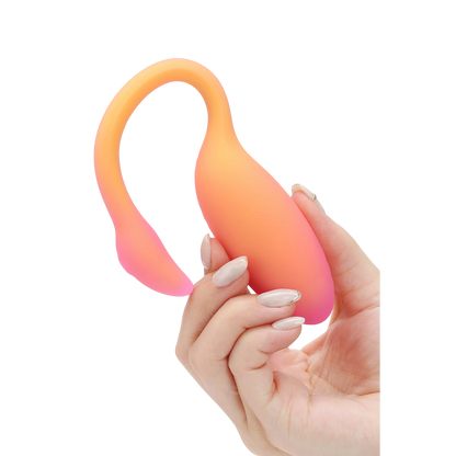 Main tenant l'oeuf vibrant Flamingo Max orange et rose en silicone doux, echelle de taille - Oh My God'Z