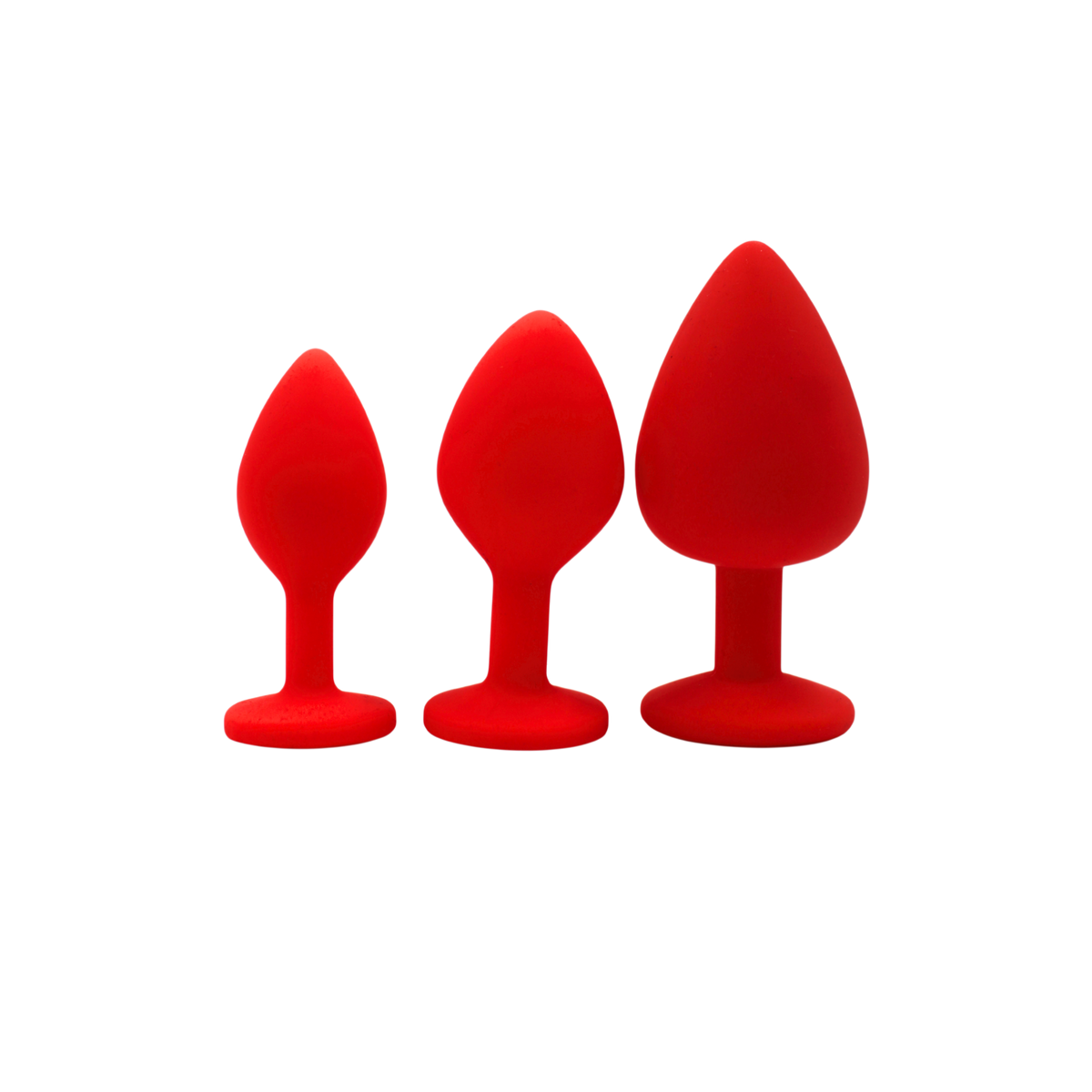 Trois plugs anaux bijou rouges en silicone medical presentes cote a cote par taille croissante - Oh My God'Z
