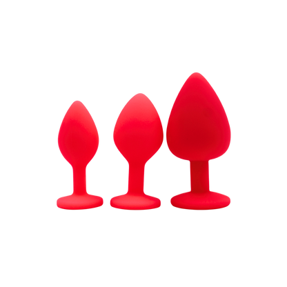 Trois plugs anaux bijoux roses en silicone PINKY Coeur Ardent, tailles S, M et L cote a cote - Oh My God'Z
