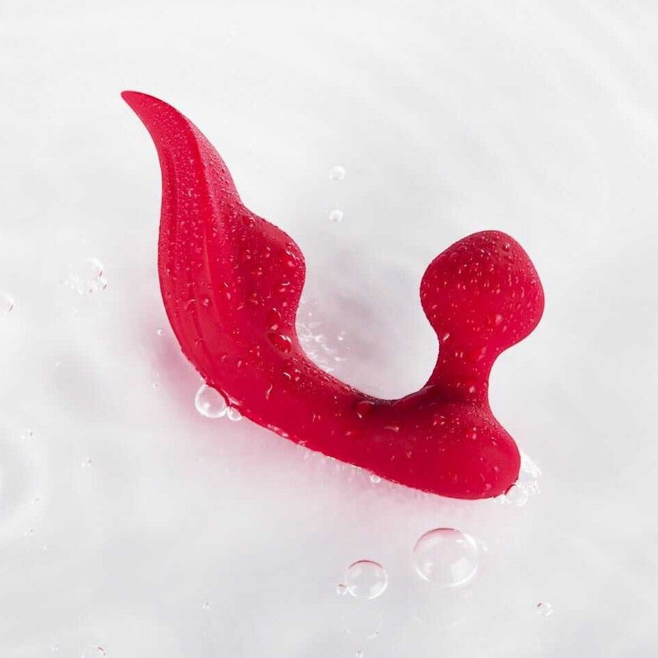 Vibromasseur Lamia rose étanche sur surface humide avec gouttes d'eau et bulles - Oh My God'Z