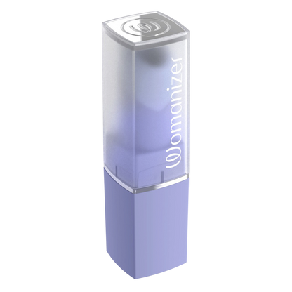 Womanizer Beauty violet ferme, capuchon translucide logo blanc et base violette en ABS brillant - Oh My God'Z